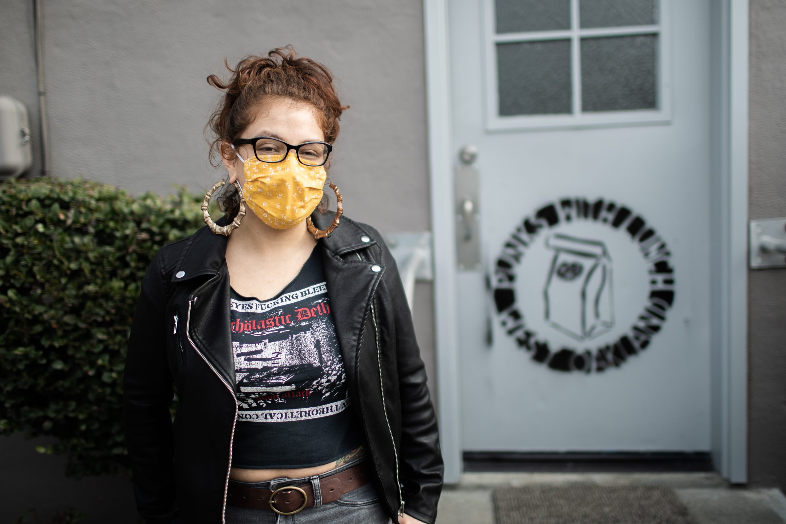 Alejandra Del Pinal, an organizer with Punks with Lunch in front of their HQ