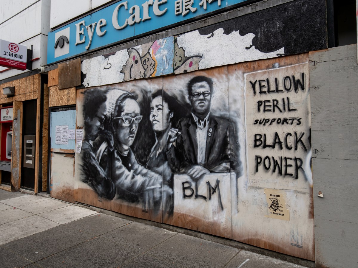 "Yellow Peril Supports Black Power" mural in Chinatown. One of the many murals in the area supporting Asian and Black American unity.