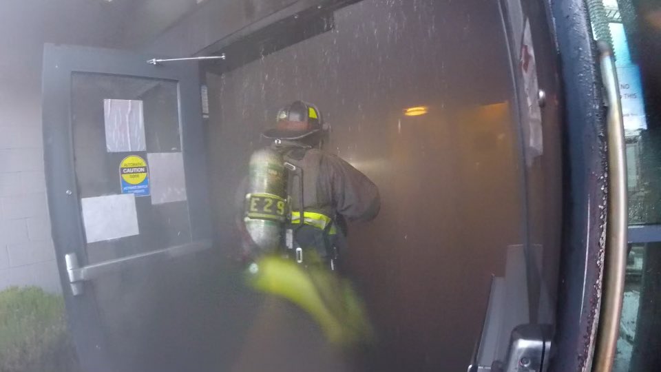 firefighters entering building