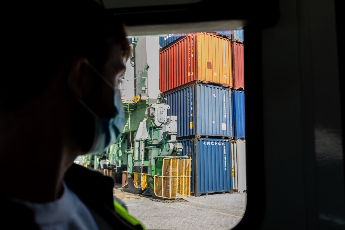 Dan Moore, this article's author, looks out of the window of a bus during at recent tour of Howard Terminal at the Port of Oakland.