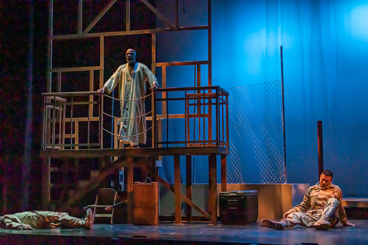 Othello (L. Peter Callender) hears of the death of Roderigo (Gabriel Ross) and wounding of Michael Cassio (Ariel Sandino) during a 2019 AASC performance.