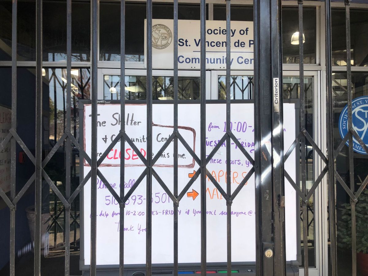locked fence in front of white board