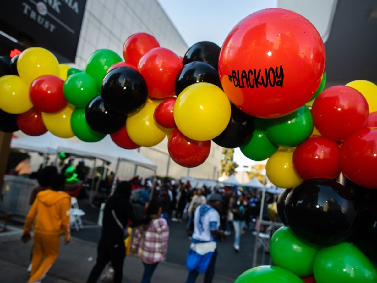 Balloons greet festival-goers at the 2022 Black Joy Parade in downtown Oakland.