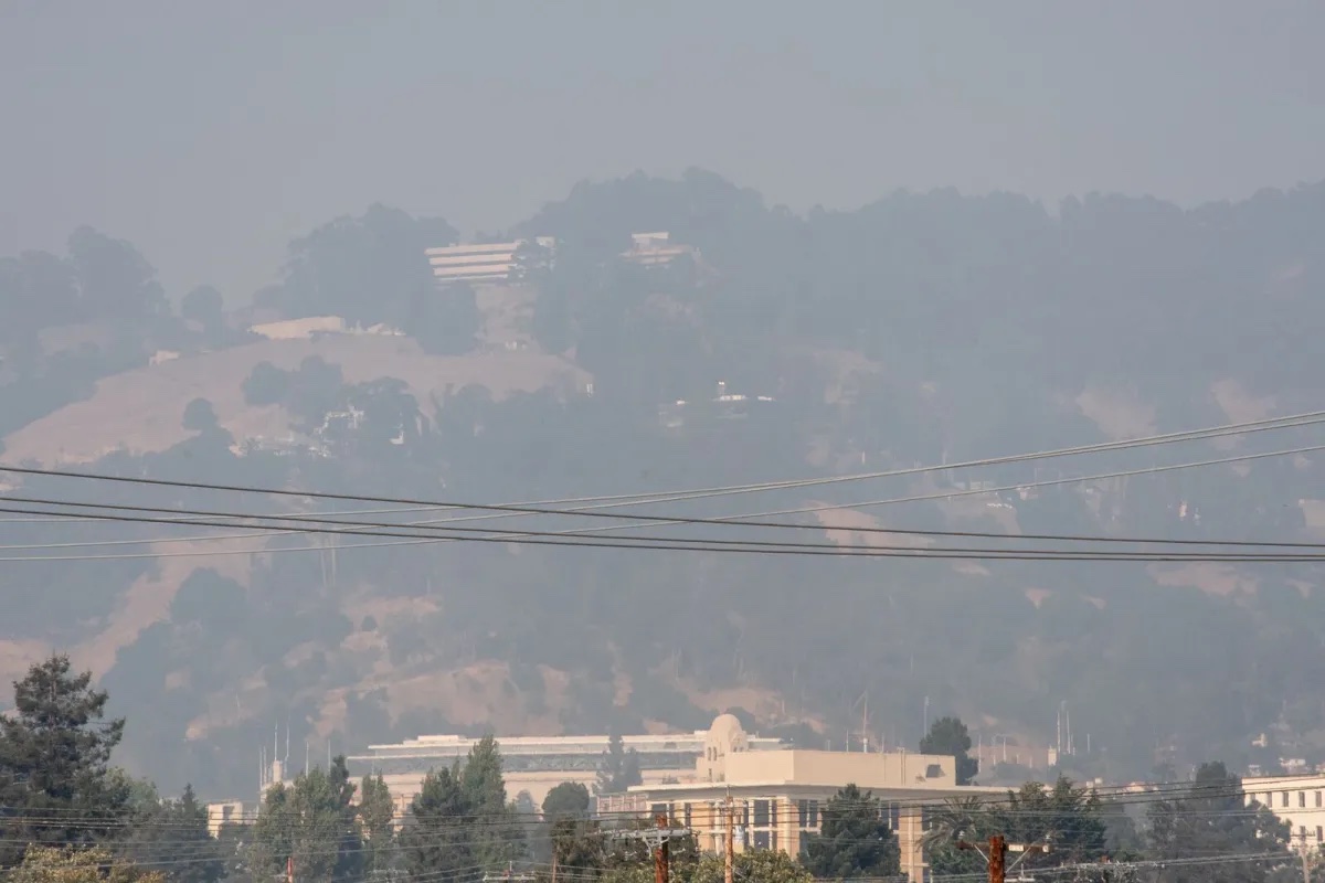 Smoke obscures the East Bay hills.