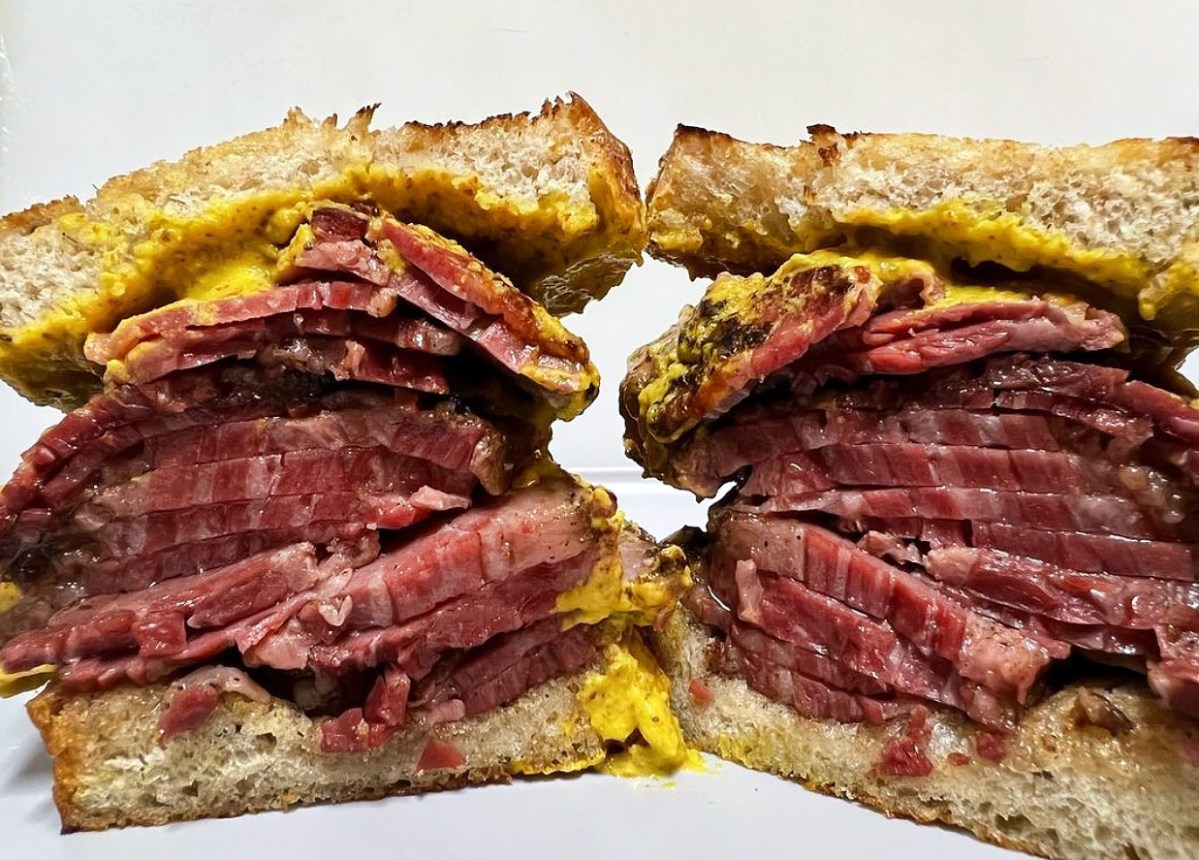 Pastrami with mustard on rye sandwich from Pyro Pastrami.
